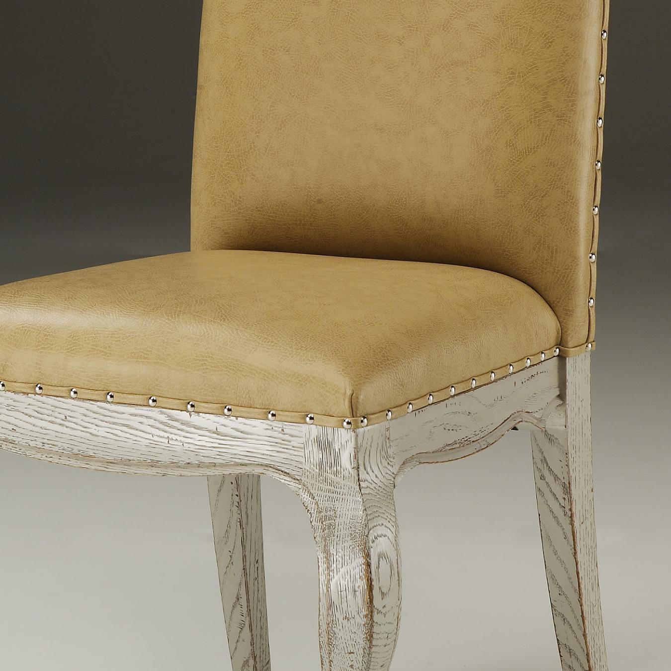 Gestoffeerde stoel in beige leer