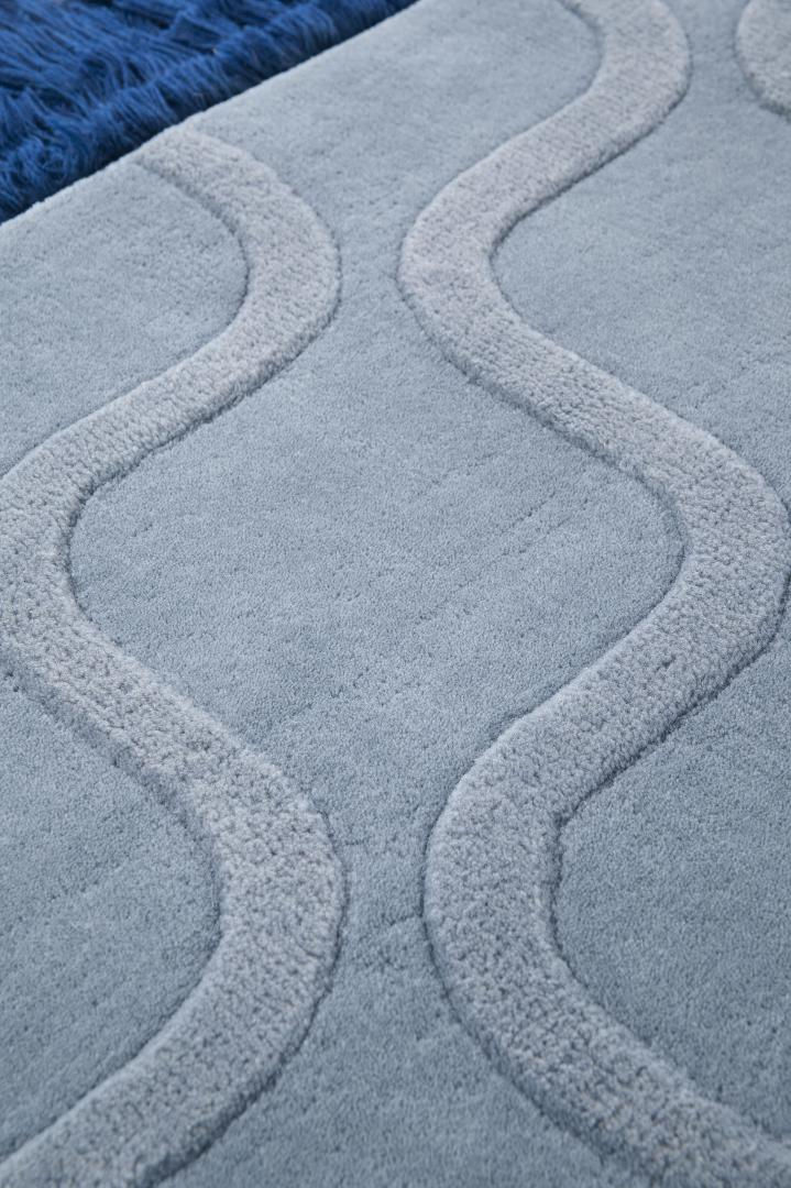Lichtblauw handgetuft vloerkleed