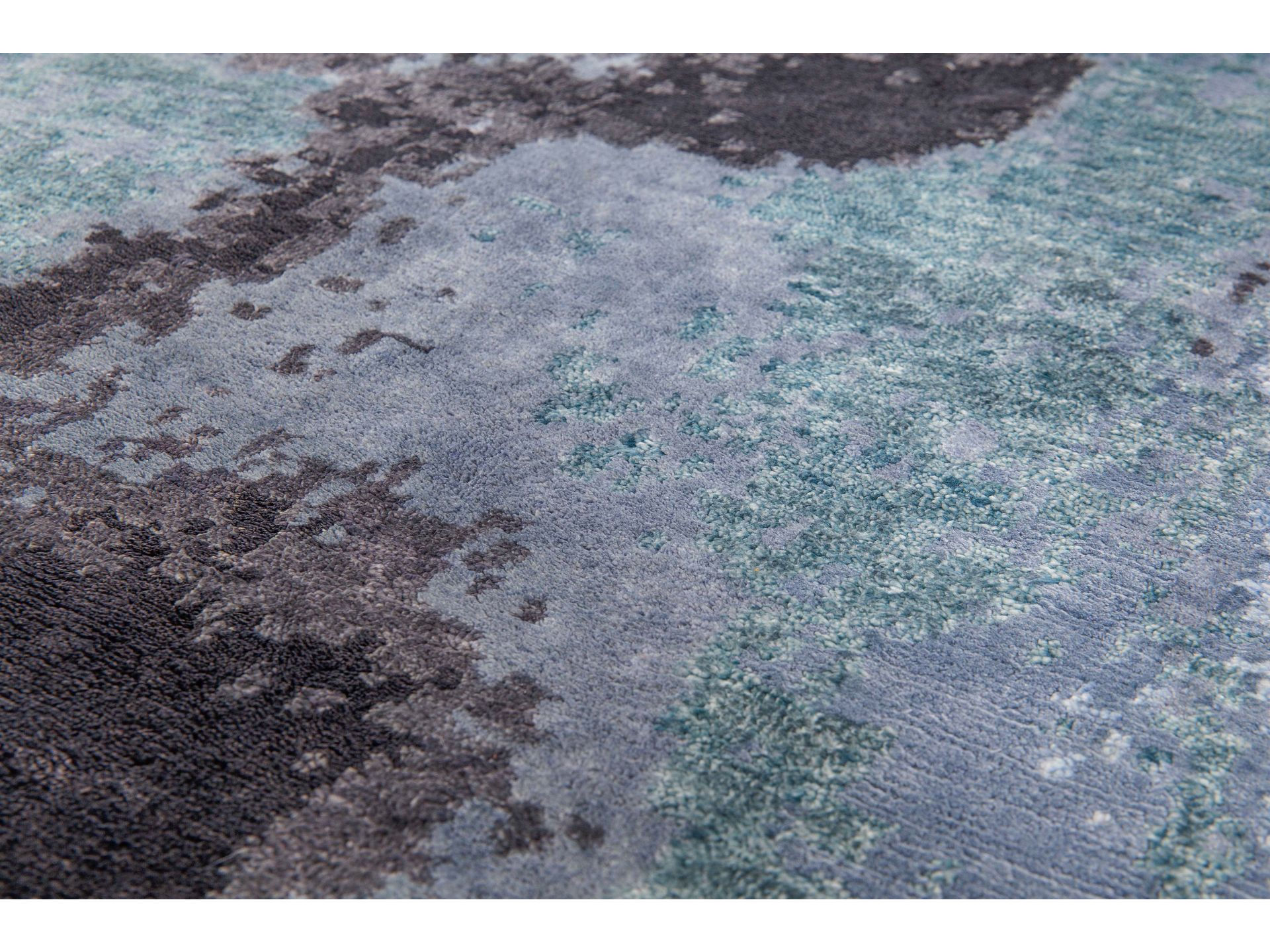 Handgeknoopt abstract blauw vloerkleed
