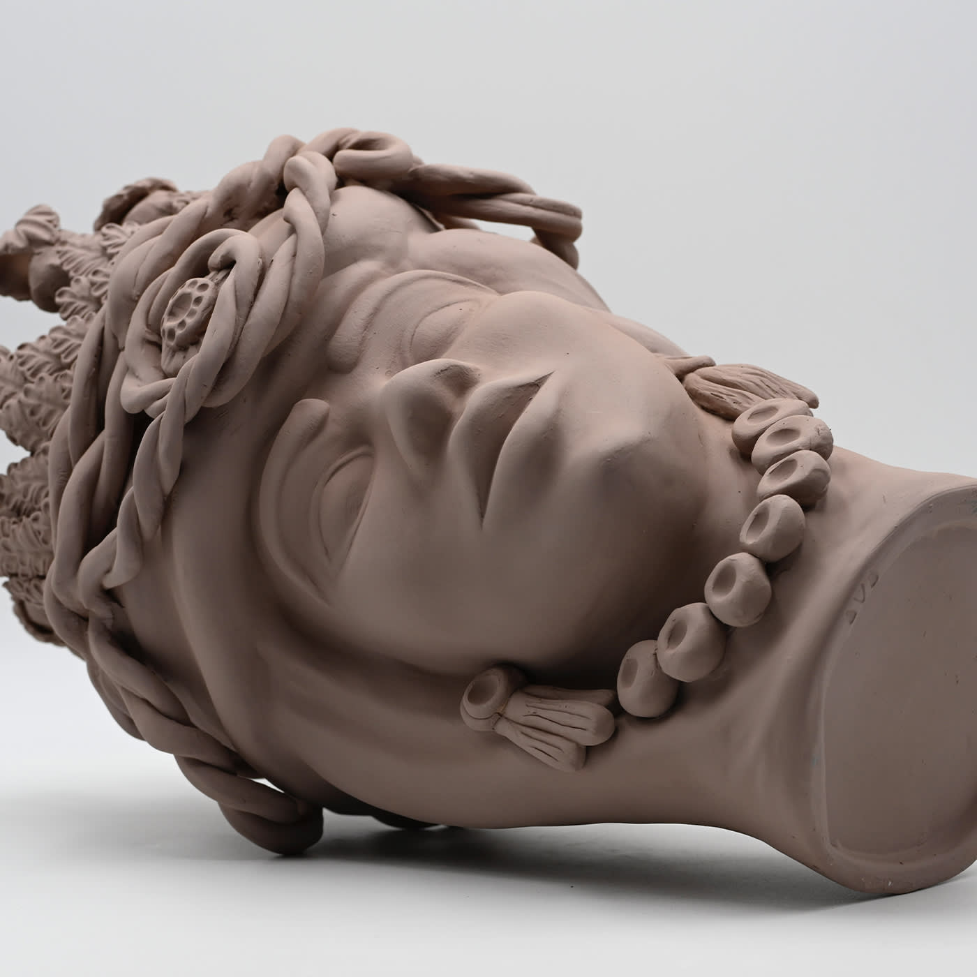 Moor's Head zandkleurige sculptuur