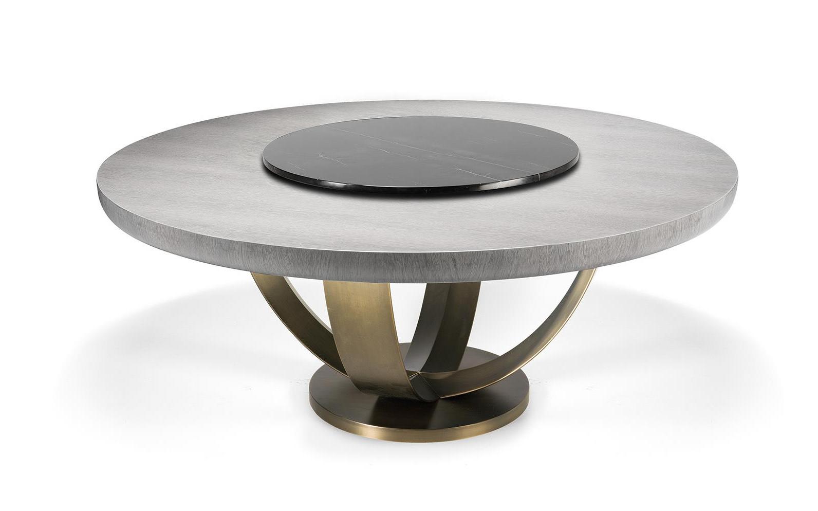 Ronde eettafel met bronzen basis