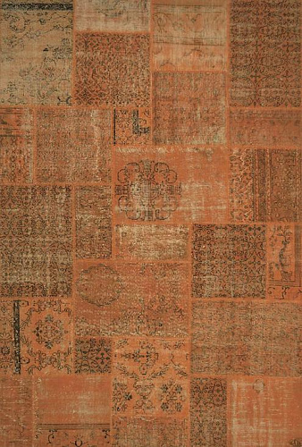 Oranje patchwork tapijt