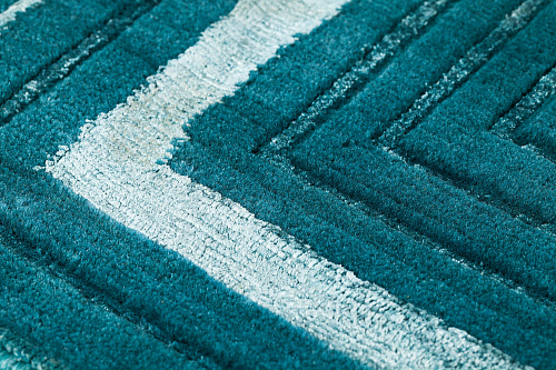 Handgeknoopt groen kader wol & viscose tapijt