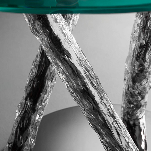 Ronde glazen eettafel met sculpturale poten