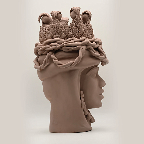 Moor's Head zandkleurige sculptuur