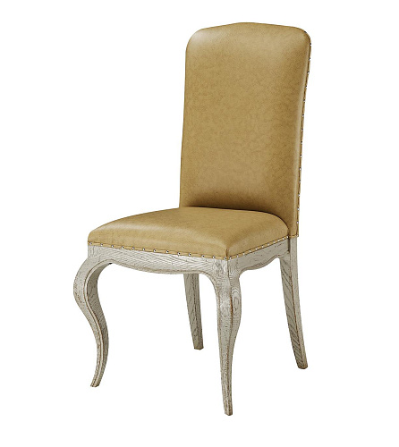 Gestoffeerde stoel in beige leer